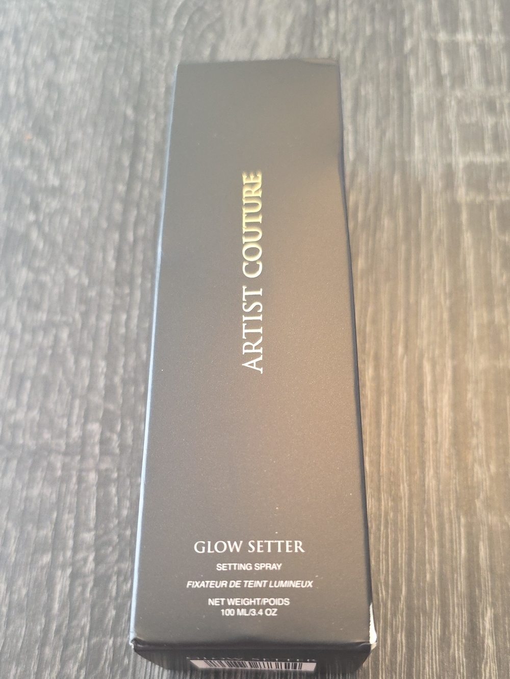 Product image is cosmetic setting spray